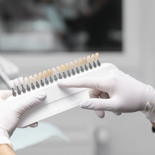 close-up-hands-wearing-protective-gloves